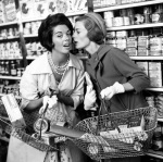 Women whispering in shop, 1960 giclee art print