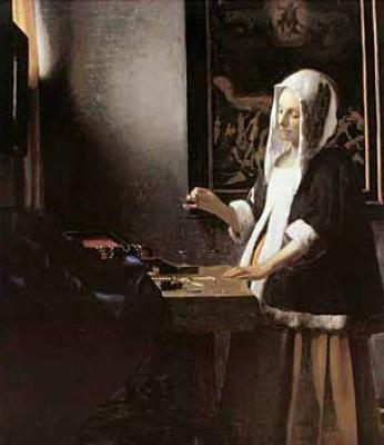 Woman holding a balance, 1664 art print by Jan Vermeer