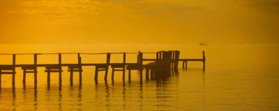 Pier With Orange Sky art print by Ruth Burke