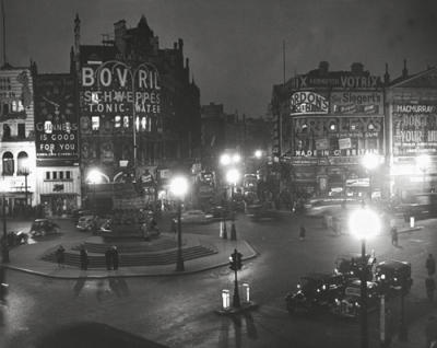 Piccadilly Circus at Night, 1949 art print by William Sumits