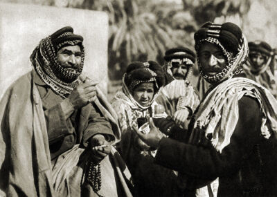 A Sheikh enjoying the famous Arab Coffee in Irag