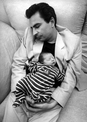 Infant and man sleeping