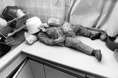 Child sleeping on the kitchen counter