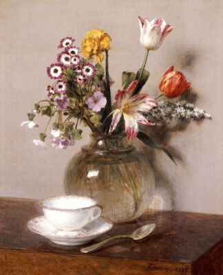 A Vase Of Flowers With A Coffee Cup