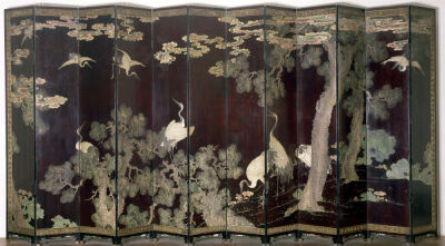 Coromandel screen depicting cranes pine trees and clouds