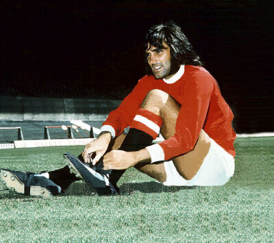 George Best doing his boots up